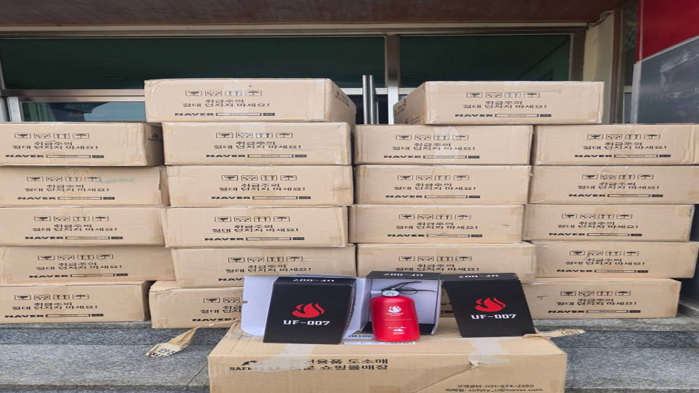 25.6.25.홍천소방서에 차량용 소화기 기탁2.jpg